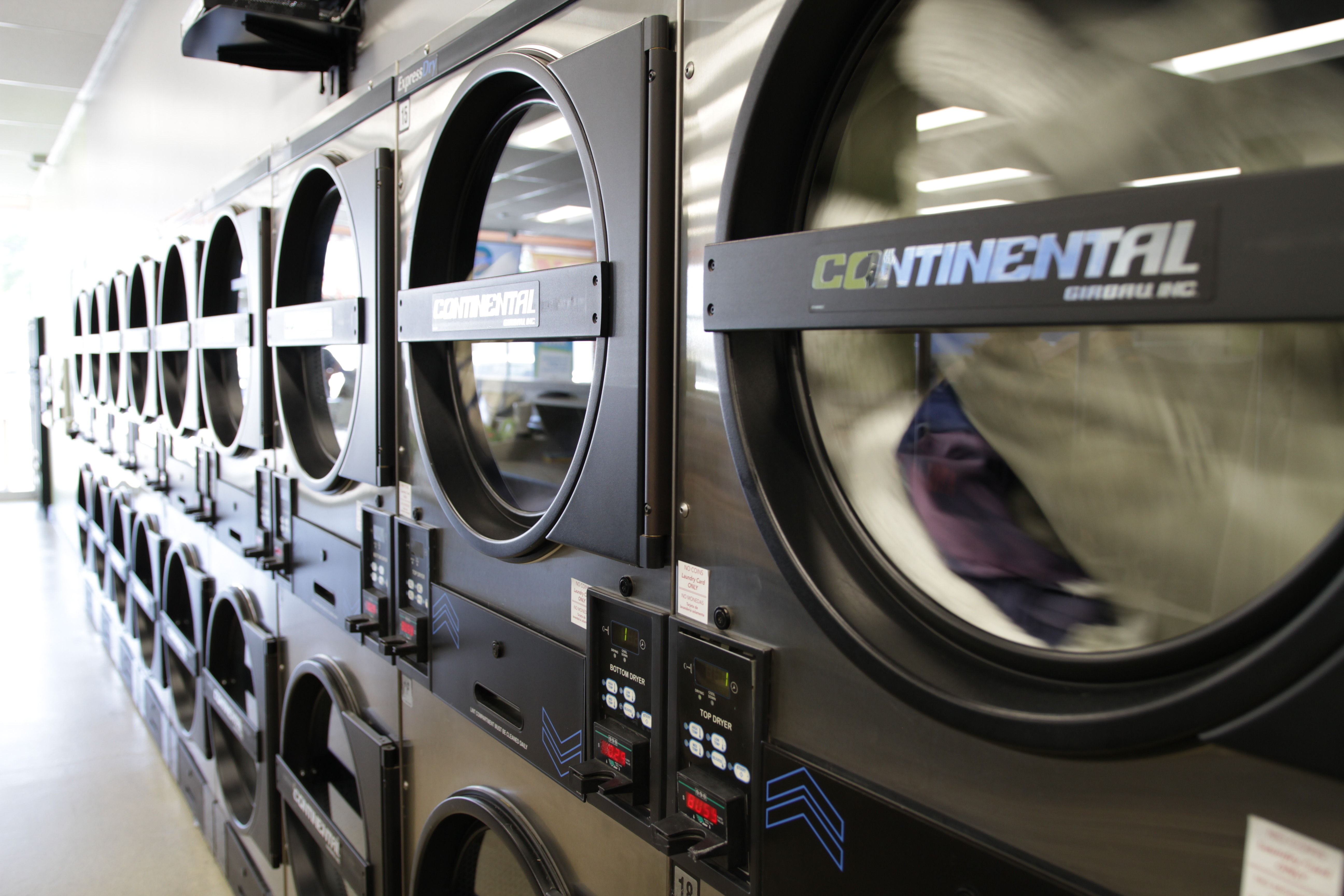 Half Price Laundry team providing friendly wash and fold service